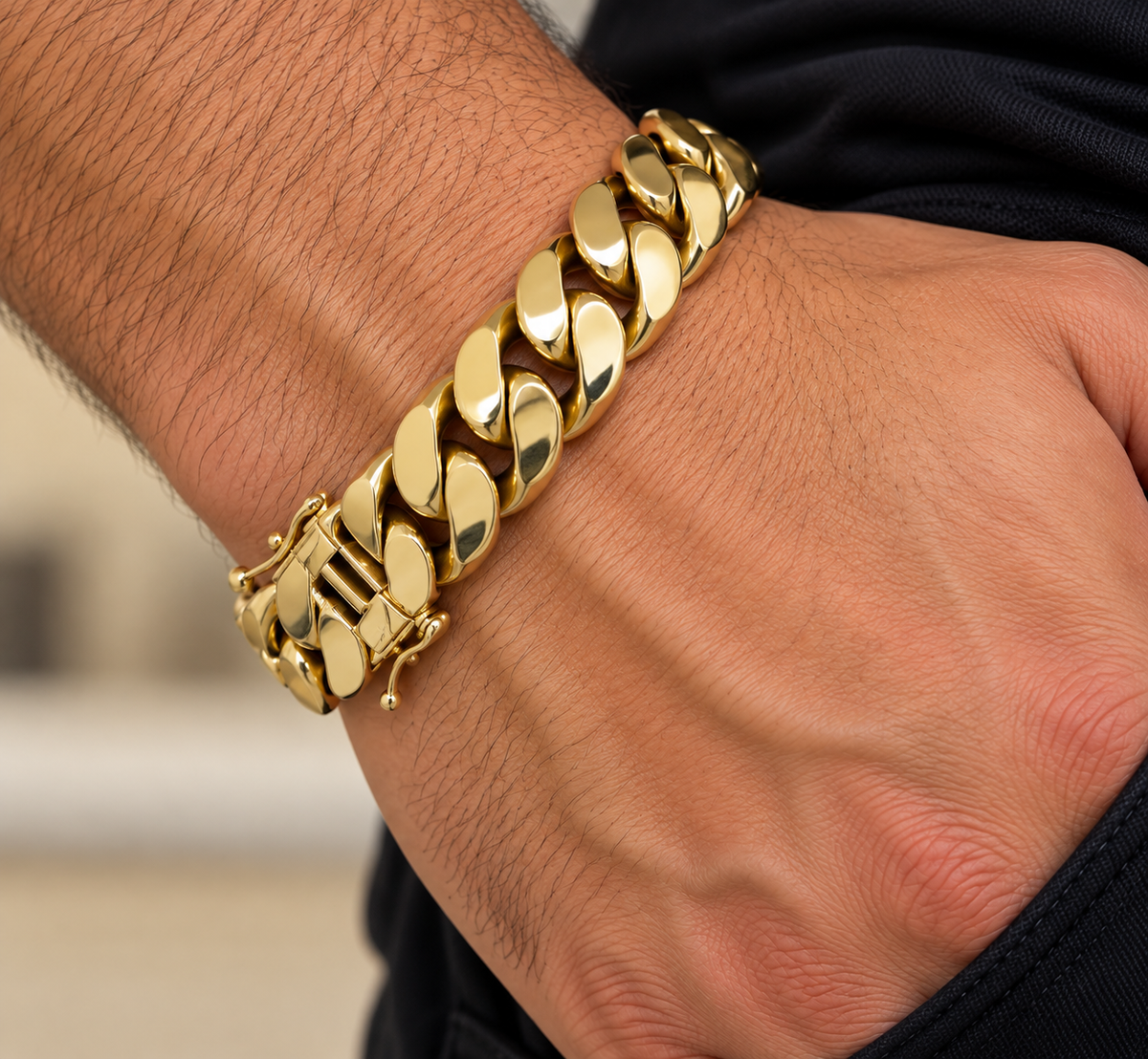 Men's 10K yellow gold semi-solid Cuban link bracelet, 10mm, worn on the wrist