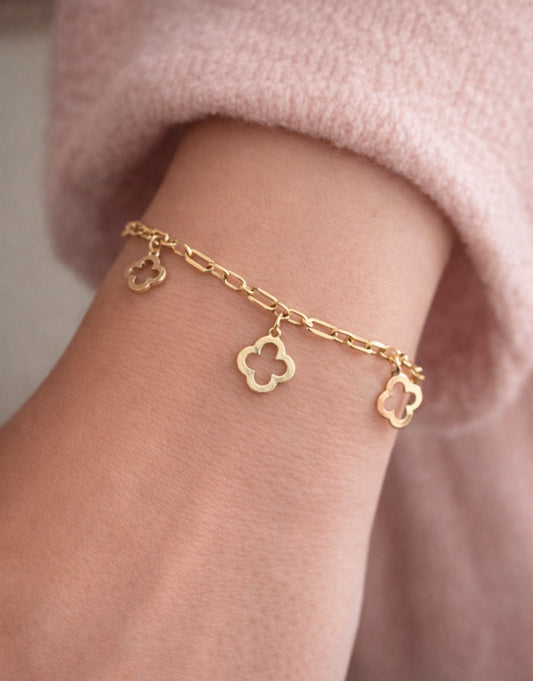 Beautiful bracelet with 10k gold pendants real size 7.5 and fits size 7