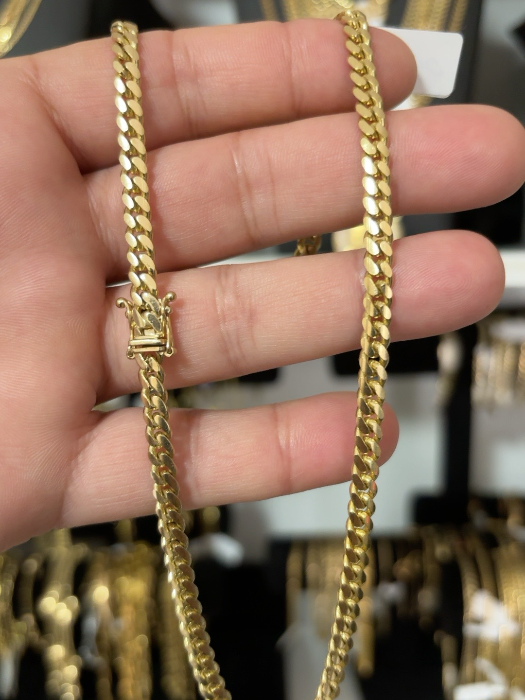 10K gold Cuban link chain 5mm 18 inch worn on neck