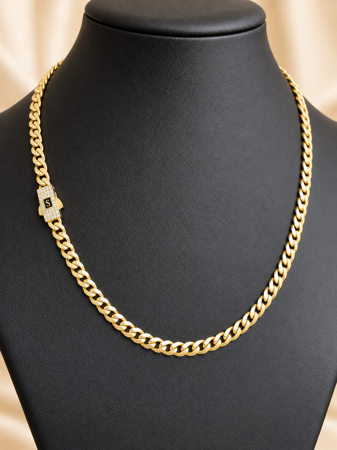 10K gold semi-solid Cuban link chain 5mm with stone-set box clasp on display - Alejandro Jewelry