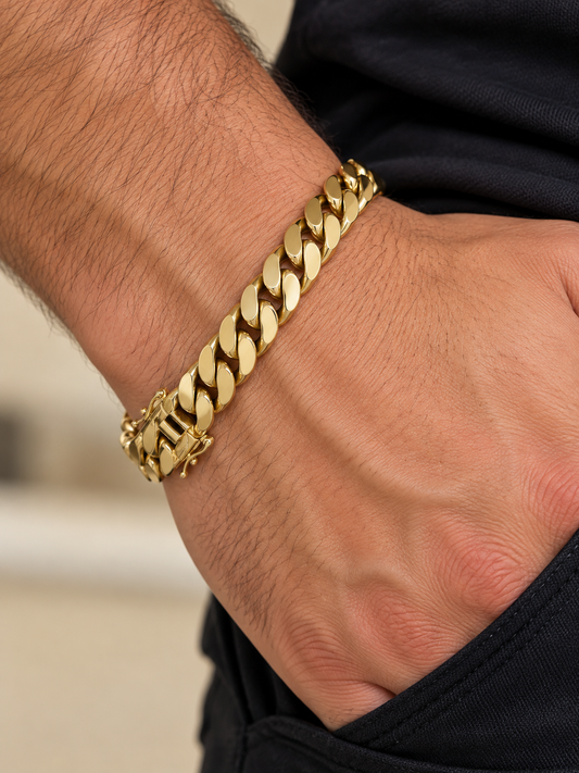 Men's 10K yellow gold semi-solid Cuban link bracelet, 8.2mm, worn on the wrist