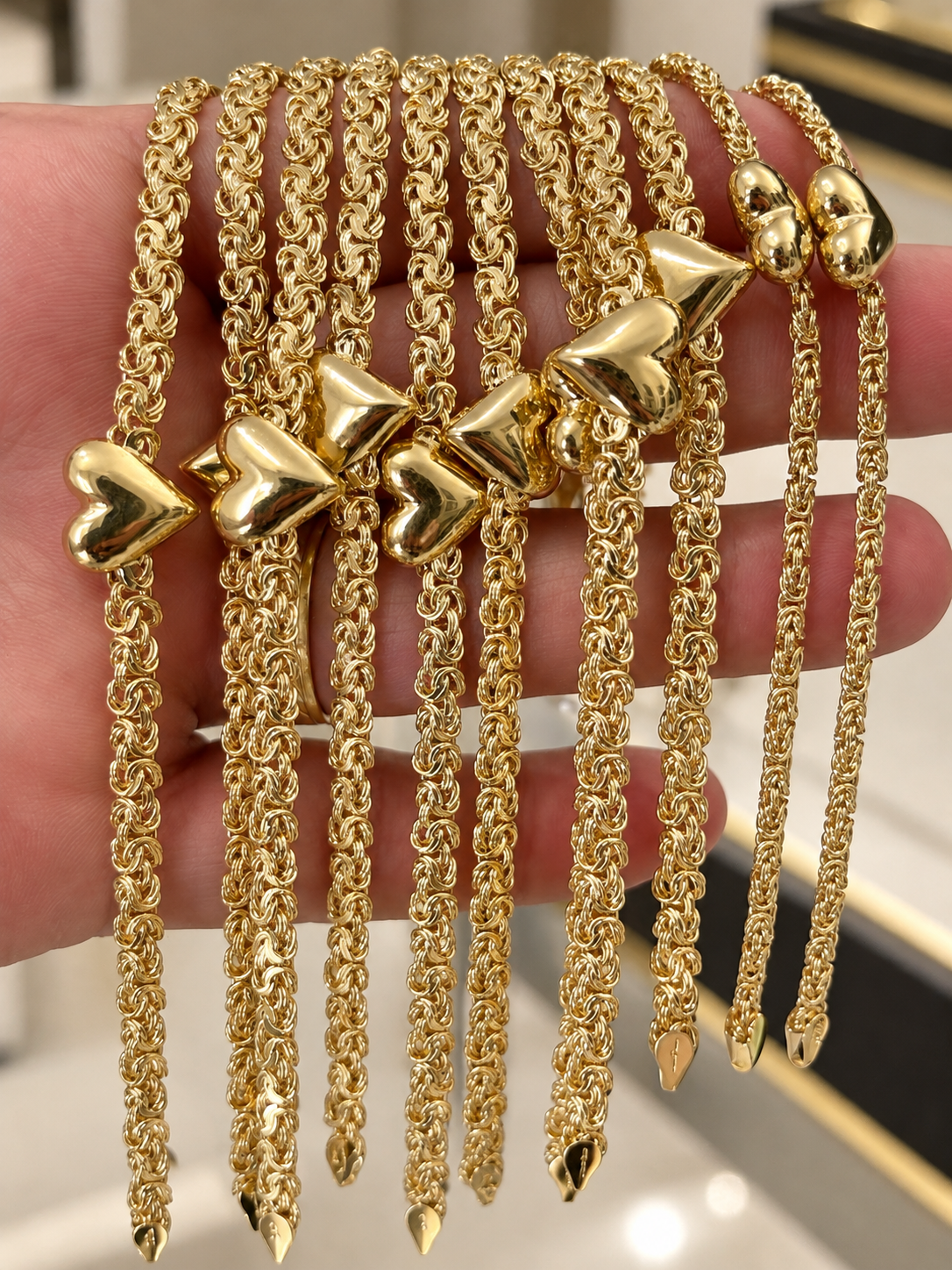 10K yellow gold Byzantine bracelets with puffed hearts, 5mm, size 7