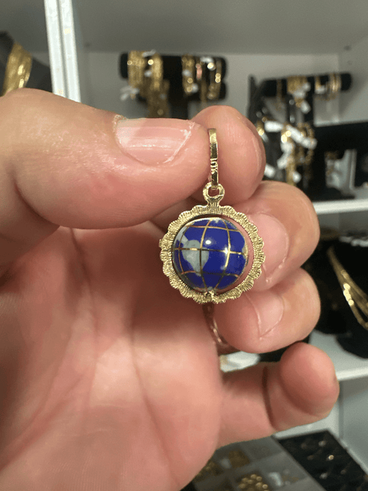 Beautiful Globe Pendant in Real Solid 10K Gold. This unique and elegant world globe design features a detailed blue enamel finish with luxurious gold accents, symbolizing travel, dreams, and connection around the world. Crafted in genuine solid 10K gold w - Alejandro Jewelry LLC